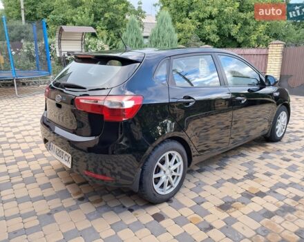 Черный Киа Рио, объемом двигателя 1.4 л и пробегом 172 тыс. км за 5700 $, фото 4 на Automoto.ua