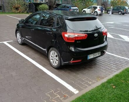 Черный Киа Рио, объемом двигателя 1.6 л и пробегом 120 тыс. км за 8900 $, фото 3 на Automoto.ua