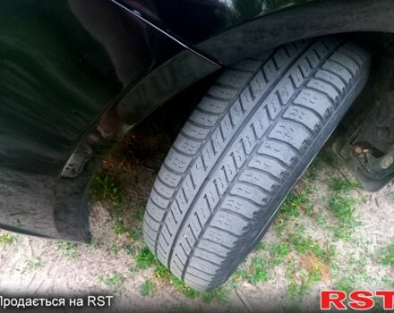 Чорний Кіа Ріо, об'ємом двигуна 1.6 л та пробігом 113 тис. км за 8500 $, фото 5 на Automoto.ua