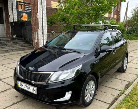 Чорний Кіа Ріо, об'ємом двигуна 1.6 л та пробігом 17600 тис. км за 7300 $, фото 2 на Automoto.ua