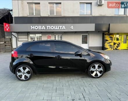Чорний Кіа Ріо, об'ємом двигуна 1.59 л та пробігом 128 тис. км за 5500 $, фото 11 на Automoto.ua