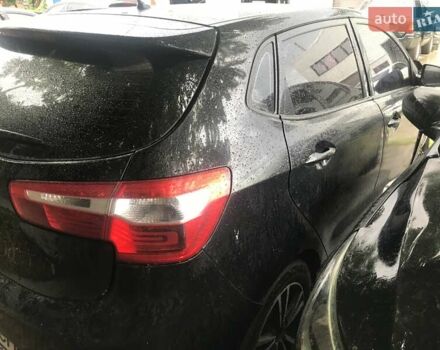 Чорний Кіа Ріо, об'ємом двигуна 1.6 л та пробігом 137 тис. км за 2999 $, фото 7 на Automoto.ua