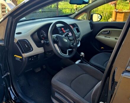 Чорний Кіа Ріо, об'ємом двигуна 1.6 л та пробігом 144 тис. км за 7300 $, фото 7 на Automoto.ua