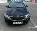 Черный Киа Рио, объемом двигателя 1.4 л и пробегом 125 тыс. км за 6000 $, фото 1 на Automoto.ua