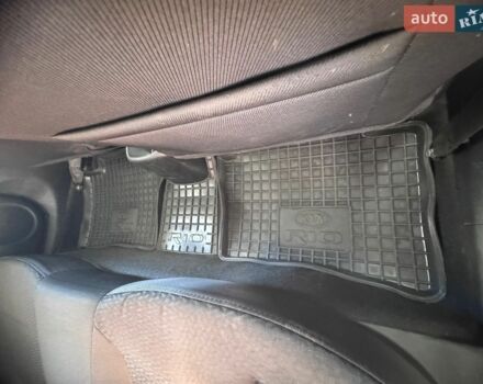 Чорний Кіа Ріо, об'ємом двигуна 1.4 л та пробігом 53 тис. км за 8501 $, фото 10 на Automoto.ua