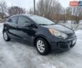 Черный Киа Рио, объемом двигателя 1.6 л и пробегом 149 тыс. км за 7200 $, фото 1 на Automoto.ua