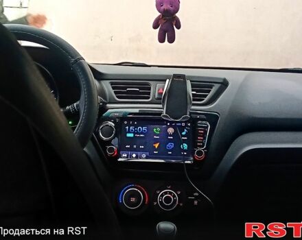 Чорний Кіа Ріо, об'ємом двигуна 1.6 л та пробігом 16000 тис. км за 7800 $, фото 9 на Automoto.ua