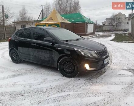 Чорний Кіа Ріо, об'ємом двигуна 1.6 л та пробігом 157 тис. км за 8300 $, фото 6 на Automoto.ua
