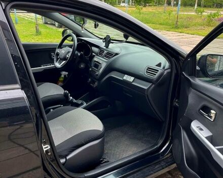 Чорний Кіа Ріо, об'ємом двигуна 1.6 л та пробігом 17600 тис. км за 7300 $, фото 7 на Automoto.ua