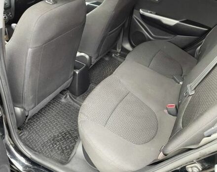 Черный Киа Рио, объемом двигателя 1.6 л и пробегом 155 тыс. км за 6600 $, фото 10 на Automoto.ua