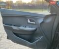 Чорний Кіа Ріо, об'ємом двигуна 1.4 л та пробігом 169 тис. км за 4499 $, фото 11 на Automoto.ua