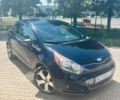 Чорний Кіа Ріо, об'ємом двигуна 1.59 л та пробігом 125 тис. км за 6500 $, фото 1 на Automoto.ua