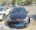 Чорний Кіа Ріо, об'ємом двигуна 1.6 л та пробігом 133 тис. км за 6023 $, фото 1 на Automoto.ua
