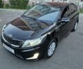 Черный Киа Рио, объемом двигателя 1.6 л и пробегом 113 тыс. км за 8395 $, фото 1 на Automoto.ua
