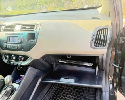 Чорний Кіа Ріо, об'ємом двигуна 1.6 л та пробігом 133 тис. км за 6023 $, фото 10 на Automoto.ua