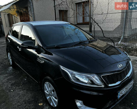 Черный Киа Рио, объемом двигателя 1.6 л и пробегом 162 тыс. км за 7000 $, фото 1 на Automoto.ua