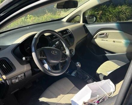 Чорний Кіа Ріо, об'ємом двигуна 1.6 л та пробігом 133 тис. км за 6023 $, фото 8 на Automoto.ua