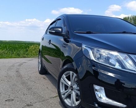 Черный Киа Рио, объемом двигателя 1.59 л и пробегом 67 тыс. км за 8500 $, фото 1 на Automoto.ua