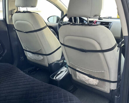 Черный Киа Рио, объемом двигателя 1.6 л и пробегом 280 тыс. км за 7700 $, фото 5 на Automoto.ua