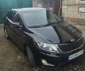 Черный Киа Рио, объемом двигателя 1.59 л и пробегом 238 тыс. км за 6400 $, фото 1 на Automoto.ua