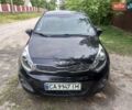 Черный Киа Рио, объемом двигателя 1.12 л и пробегом 255 тыс. км за 6500 $, фото 1 на Automoto.ua
