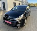 Черный Киа Рио, объемом двигателя 1.4 л и пробегом 159 тыс. км за 11200 $, фото 1 на Automoto.ua