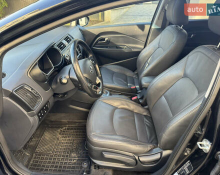 Черный Киа Рио, объемом двигателя 1.4 л и пробегом 159 тыс. км за 11500 $, фото 14 на Automoto.ua