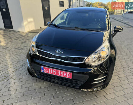 Черный Киа Рио, объемом двигателя 1.4 л и пробегом 159 тыс. км за 11500 $, фото 1 на Automoto.ua
