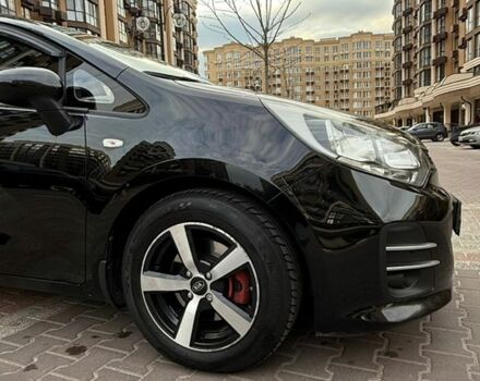 Чорний Кіа Ріо, об'ємом двигуна 1.4 л та пробігом 74 тис. км за 12500 $, фото 11 на Automoto.ua