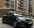 Чорний Кіа Ріо, об'ємом двигуна 1.4 л та пробігом 74 тис. км за 12500 $, фото 16 на Automoto.ua