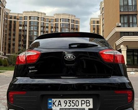 Чорний Кіа Ріо, об'ємом двигуна 1.4 л та пробігом 74 тис. км за 12500 $, фото 3 на Automoto.ua