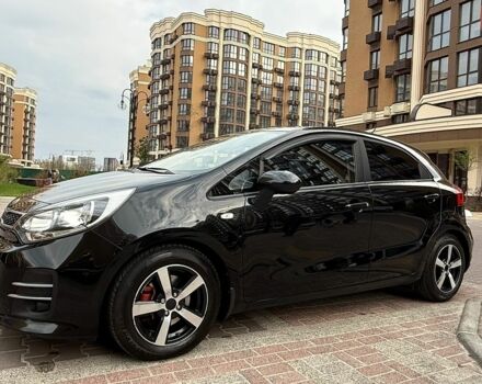 Чорний Кіа Ріо, об'ємом двигуна 1.4 л та пробігом 74 тис. км за 12500 $, фото 14 на Automoto.ua