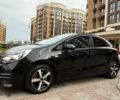 Чорний Кіа Ріо, об'ємом двигуна 1.4 л та пробігом 74 тис. км за 12500 $, фото 14 на Automoto.ua