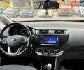 Черный Киа Рио, объемом двигателя 1.4 л и пробегом 74 тыс. км за 12900 $, фото 1 на Automoto.ua