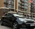 Черный Киа Рио, объемом двигателя 1.4 л и пробегом 74 тыс. км за 12900 $, фото 1 на Automoto.ua