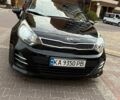 Чорний Кіа Ріо, об'ємом двигуна 1.4 л та пробігом 74 тис. км за 12500 $, фото 4 на Automoto.ua