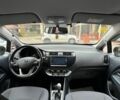 Чорний Кіа Ріо, об'ємом двигуна 1.4 л та пробігом 74 тис. км за 12500 $, фото 5 на Automoto.ua