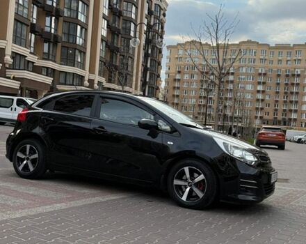 Чорний Кіа Ріо, об'ємом двигуна 1.4 л та пробігом 74 тис. км за 12500 $, фото 1 на Automoto.ua