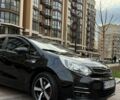 Чорний Кіа Ріо, об'ємом двигуна 1.4 л та пробігом 74 тис. км за 12500 $, фото 7 на Automoto.ua