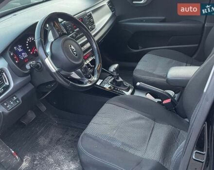 Чорний Кіа Ріо, об'ємом двигуна 1.4 л та пробігом 51 тис. км за 13000 $, фото 7 на Automoto.ua