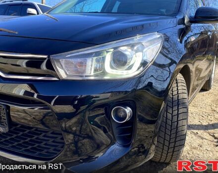 Чорний Кіа Ріо, об'ємом двигуна 1.4 л та пробігом 89 тис. км за 12700 $, фото 11 на Automoto.ua