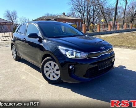 Чорний Кіа Ріо, об'ємом двигуна 1.4 л та пробігом 89 тис. км за 12700 $, фото 1 на Automoto.ua