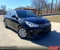 Чорний Кіа Ріо, об'ємом двигуна 1.4 л та пробігом 89 тис. км за 12700 $, фото 1 на Automoto.ua