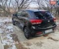 Черный Киа Рио, объемом двигателя 1.4 л и пробегом 63 тыс. км за 13150 $, фото 4 на Automoto.ua