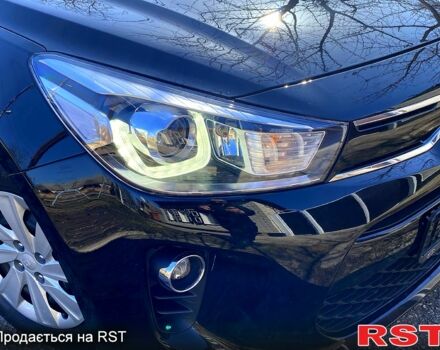 Чорний Кіа Ріо, об'ємом двигуна 1.4 л та пробігом 89 тис. км за 12700 $, фото 10 на Automoto.ua