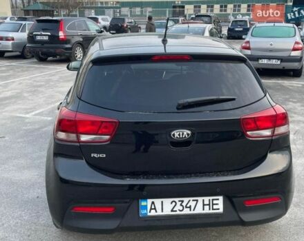 Чорний Кіа Ріо, об'ємом двигуна 1.4 л та пробігом 51 тис. км за 13000 $, фото 1 на Automoto.ua