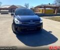 Чорний Кіа Ріо, об'ємом двигуна 1.4 л та пробігом 211 тис. км за 12700 $, фото 1 на Automoto.ua