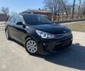 Черный Киа Рио, объемом двигателя 1.4 л и пробегом 87 тыс. км за 12700 $, фото 1 на Automoto.ua