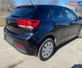 Чорний Кіа Ріо, об'ємом двигуна 1.4 л та пробігом 89 тис. км за 12700 $, фото 22 на Automoto.ua