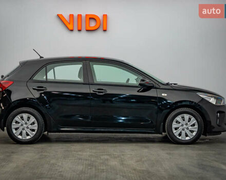 Чорний Кіа Ріо, об'ємом двигуна 1.2 л та пробігом 94 тис. км за 10904 $, фото 3 на Automoto.ua